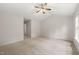 Spacious bedroom with ceiling fan and carpeted floors at 207 Bell Tower Way, Morrisville, NC 27560