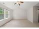 Spacious bedroom with vaulted ceiling, carpet, and natural light at 207 Bell Tower Way, Morrisville, NC 27560