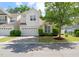 Charming two-story home with a well-manicured lawn and attached two-car garage at 207 Bell Tower Way, Morrisville, NC 27560