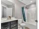 Full bathroom with a vanity and shower/tub combination at 208 Gillean Ln, Holly Springs, NC 27540