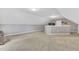 Open bonus room with carpet flooring and neutral walls at 208 Gillean Ln, Holly Springs, NC 27540