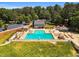 Aerial view of the community pool with swimming lanes and ample seating areas at 208 Gillean Ln, Holly Springs, NC 27540