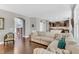 Spacious living room with open floor plan and direct access to the kitchen at 208 Gillean Ln, Holly Springs, NC 27540