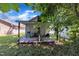 Backyard featuring a covered patio area, offering a private outdoor space at 215 N 4Th St, Smithfield, NC 27577