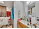 The bathroom features a single sink vanity and a shower tub combo at 215 N 4Th St, Smithfield, NC 27577