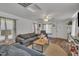 A cozy living space with hardwood floors, two sofas and ceiling fan at 215 N 4Th St, Smithfield, NC 27577