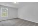 Bedroom with neutral walls, carpet, and a view to the outside at 22 Sagamore Avenue, Angier, NC 27501