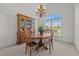 Bright dining room with a large window, traditional furniture, and a chandelier at 2240 Delaney Dr, Burlington, NC 27215