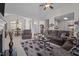 Open-concept living room featuring a fireplace, and a view of the dining area at 2240 Delaney Dr, Burlington, NC 27215