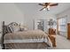 Cozy main bedroom featuring a comfortable bed, wooden chest and ensuite bathroom at 2240 Delaney Dr, Burlington, NC 27215