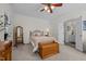 Comfortable bedroom featuring a queen-size bed, wooden chest and mirror at 2240 Delaney Dr, Burlington, NC 27215