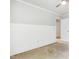 A new empty bedroom with white walls and neutral flooring at 2523 Ferdinand Dr, Knightdale, NC 27545