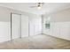 An empty room with white walls, a ceiling fan, a window, and a closet at 2523 Ferdinand Dr, Knightdale, NC 27545
