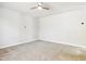 Spacious bedroom with neutral carpet and ceiling fan at 2523 Ferdinand Dr, Knightdale, NC 27545