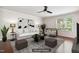 Comfortable living room with hardwood floors, neutral-colored walls, and neutral colored furniture at 2523 Ferdinand Dr, Knightdale, NC 27545