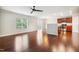 Bright open space features hardwood floors, recessed lighting, a ceiling fan, and access to an outdoor patio at 2523 Ferdinand Dr, Knightdale, NC 27545