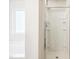 Bright bathroom showcase of a new shower with glass doors and tub at 2523 Ferdinand Dr, Knightdale, NC 27545