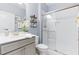 Modern bathroom with a glass door shower and updated sink at 2531 Impulsion Dr, New Hill, NC 27562