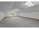 Expansive basement space with carpet floors and natural light at 2600 Snow Hill Rd, Durham, NC 27712