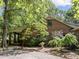 Beautiful brick home with mature landscaping and a charming porch at 2600 Snow Hill Rd, Durham, NC 27712