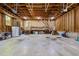 Spacious garage with ample storage space and a workbench at 2600 Snow Hill Rd, Durham, NC 27712