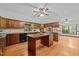 Traditional kitchen featuring an island and hardwood floors at 2600 Snow Hill Rd, Durham, NC 27712