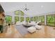 Spacious living room featuring hardwood floors and large windows at 2600 Snow Hill Rd, Durham, NC 27712