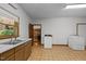 Functional utility room with laundry appliances and ample storage at 2600 Snow Hill Rd, Durham, NC 27712