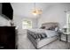 Bedroom features plush carpeting, ceiling fan, and soft, neutral color palette at 2735 Clifton Ave, Creedmoor, NC 27522
