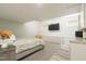This bedroom has a mounted TV and small kitchenette at 3010 Blueberry Ln, Chapel Hill, NC 27516