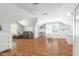 Spacious bonus room with hardwood floors, built-in shelves, and comfortable seating at 3010 Blueberry Ln, Chapel Hill, NC 27516