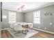 Bright dining room featuring new fixtures and modern table and chairs at 3010 Blueberry Ln, Chapel Hill, NC 27516