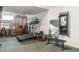 Exercise area featuring a treadmill, weights, mirror and bench at 3010 Blueberry Ln, Chapel Hill, NC 27516