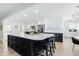 Spacious kitchen with large center island, modern appliances, and an open layout at 3010 Blueberry Ln, Chapel Hill, NC 27516