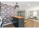 Open-concept living and laundry with unique design elements and lighting fixtures at 3010 Blueberry Ln, Chapel Hill, NC 27516