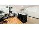 Bright office with hardwood floors, a large desk, and creative workspaces at 3010 Blueberry Ln, Chapel Hill, NC 27516