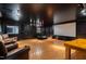 This theater features a large screen, leather seats and modern lighting at 3010 Blueberry Ln, Chapel Hill, NC 27516