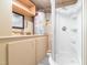 Utility room featuring water heater and standing shower at 3010 Blueberry Ln, Chapel Hill, NC 27516