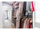 Bright walk-in closet with custom storage for clothes, shoes, and accessories at 3010 Blueberry Ln, Chapel Hill, NC 27516