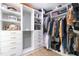Custom walk-in closet with open shelving and hanging space for optimal organization at 3010 Blueberry Ln, Chapel Hill, NC 27516