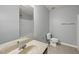 Bathroom featuring a vanity with sink and a tub with shower at 3033 Remington Oaks Cir, Cary, NC 27519