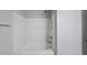 Bathroom featuring a built-in tub with shower at 3033 Remington Oaks Cir, Cary, NC 27519