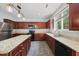 Well-equipped kitchen with granite countertops, stainless steel appliances, and ample cabinet space at 3033 Remington Oaks Cir, Cary, NC 27519
