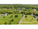 Sprawling community featuring lush green spaces and a variety of beautifully designed homes at 309 Appaloosa Trl, Bahama, NC 27503