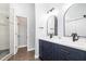 Beautiful bathroom featuring double vanity, quartz countertop and tiled flooring at 309 Appaloosa Trl, Bahama, NC 27503