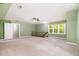 Spacious bedroom featuring carpeted floors, natural light and a ceiling fan at 309 Appaloosa Trl, Bahama, NC 27503