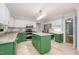 Bright kitchen featuring granite countertops, stainless steel appliances, and green cabinets at 309 Appaloosa Trl, Bahama, NC 27503