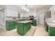 Bright kitchen featuring granite countertops, stainless steel appliances, and green cabinets at 309 Appaloosa Trl, Bahama, NC 27503