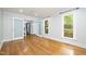 Inviting living room featuring hardwood floors, white trim, and natural light at 309 Appaloosa Trl, Bahama, NC 27503