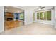Open-concept living space with a seamless transition between the cozy living room and the tile kitchen area at 309 Appaloosa Trl, Bahama, NC 27503